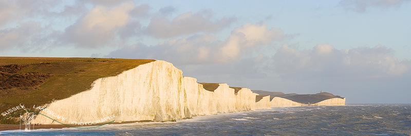 slides/Seven Sisters.jpg coast guard cottages east sussex coastal coast blue sky winter sunny seaside snow cold bitter panoramic cliffs white lighthouse seven sisters country park cuckmere haven river beach Seven Sisters